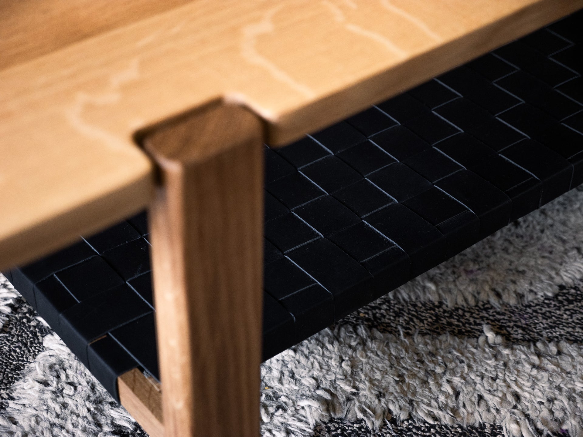 The Milli Coffee Table in White Oak with Leather Shelf